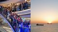 Artigiani anziani in crociera Foto di gruppo di persone su una scala con tramonto e navi sul mare