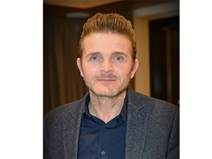 2021: Chancen und Perspektiven für das Handwerk Porträt eines Mannes mit kurzen braunen Haaren im Blazer