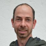 Burggrafenamt Porträt eines lächelnden Mannes mit kurzem braunem Haar und Bart