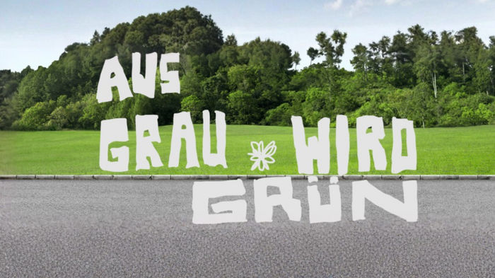 Großes Baulos – großes Risiko Grüne Wiese mit Bäumen im Hintergrund und deutscher Schriftzug