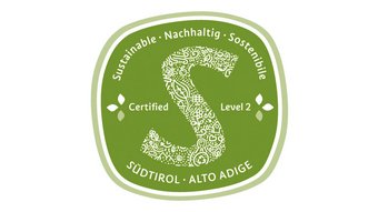 Das Nachhaltigkeitslabel Südtirol Nachhaltigkeitssiegel Südtirol Level 2 grün mit S-Motiv