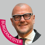 Bozen Stadt Porträt eines bärtigen Mannes mit Brille, Schrift Bürgermeister