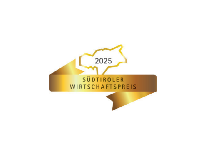 Südtiroler Wirtschaftspreis Logo SÜDTIROLER WIRTSCHAFTSPREIS 2025 mit goldenem Band und Umriss einer Region