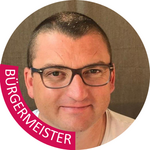 Burggrafenamt Porträt eines Mannes mit Brille und kurzem Haar