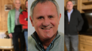 News Porträt eines lächelnden älteren Mannes mit kurzem grauem Haar