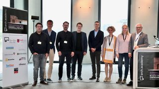 News Gruppenfoto von acht Personen bei der arch.academy Konferenz 2022 in Brixen