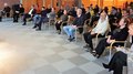 Concerto di Natale 2022: una serata da ricordare! Persone sedute in una stanza durante un evento o una riunione