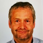 Untervinschgau Porträt eines lächelnden Mannes mit kurzen grauen Haaren