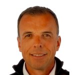 Unterpustertal/Gadertal Porträt eines lächelnden Mannes vor weißem Hintergrund