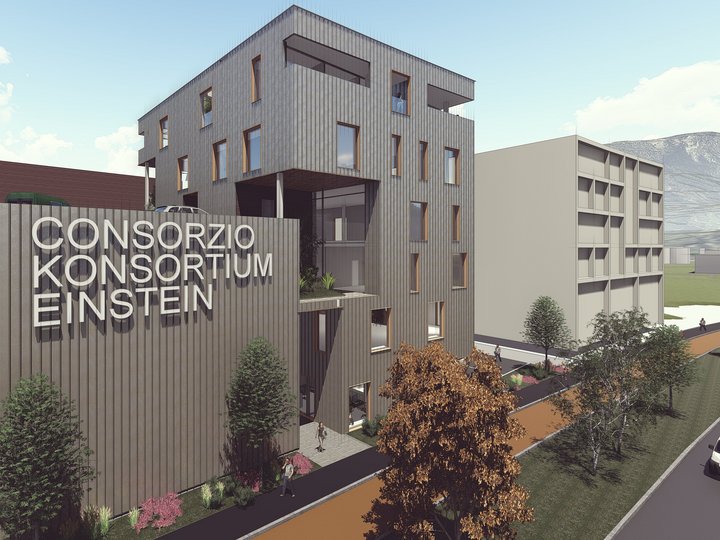 Insediamenti e spazi commerciali Edificio moderno con scritta Consorzio Einstein e alberi lungo il marciapiede