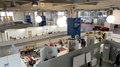 A Bolzano tutto pronto per i campionati mondiali dei mestieri WorldSkills Vista di una officina con aree di costruzione e piastrellatura in un capannone industriale