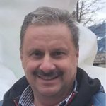 Oberpustertal Porträt eines lächelnden Mannes mit Schnurrbart im Freien